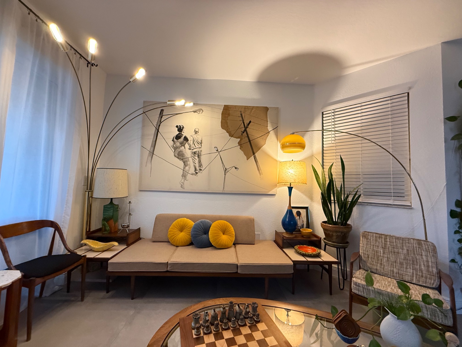 Living room with arc floor lamps
