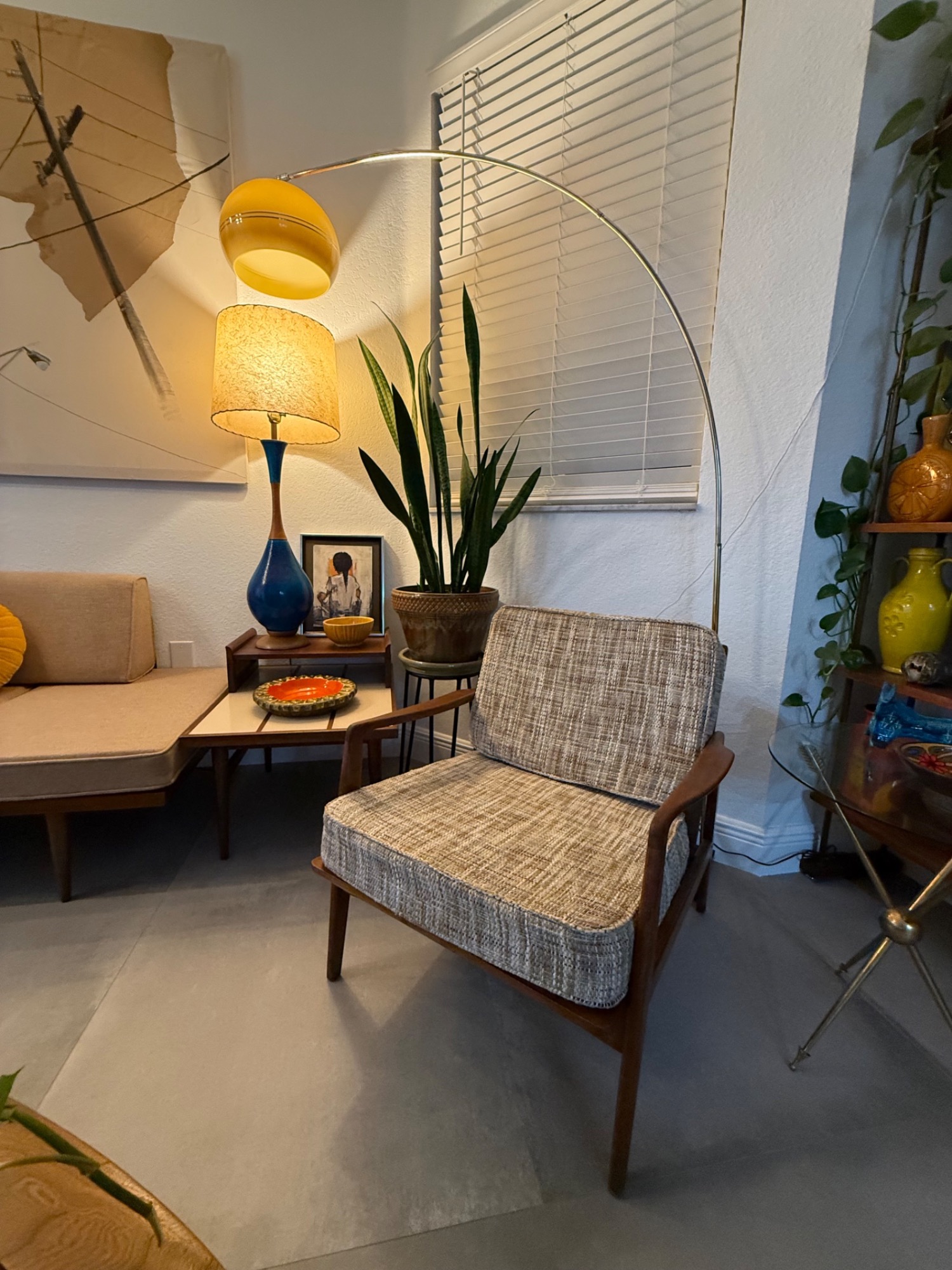 MCM lounge chair under arc lamp